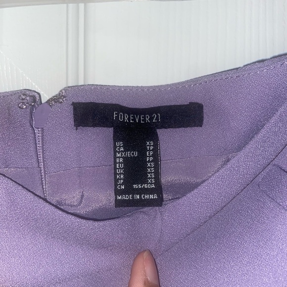 Purple mini skirt with zipper and fake pockets - Picture 3 of 5